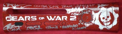 This plate was made for the Gears 2 launch at the Citywalk in Los Angeles. The plate was signed by Cliff Blezsinski, six main voice actors and two other contributors to the game's development.