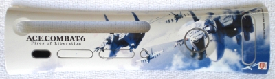 This plate was a promotional plate given to media. There are a total of six Ace Combat 6 faceplates. This is the only one that has a horizontal image. This plate and the Flight Stick Bundle plate are both more rare than the four pre-order plates. It was made by HORI.