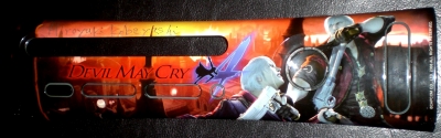This is an official devil May Cry 4 faceplate, autographed by game designer Hiroyuki Kobayashi-san.