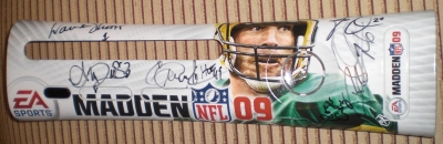This is a Madden NFL 09 faceplate by MadCatz. It is signed by football greats Eric Dickerson, Warren Moon, Roger Craig, Rod Woodson, Eddie George and Andre Reed. The autographs were obtained at the Maddenpalooza Rose Bowl Madden 09 release party.