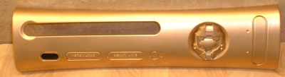 Gold plate with a gold painted Master Chief helmet attached to the power button.