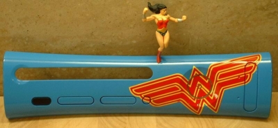 This was the Gamestop blue plate that came in the 2-pack with the snakeskin plate, painted with the Wonder Woman logo with figure attached.