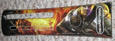 This plate is one of three retailer-specific exclusive plates. This plate featuring Marcus Fenix was available at Gamestop stores.