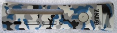 This is made by Pelican and has a white, black and blue camouflage design. This plate and the brown camo plate are made from a different plastic than other plates. It has a waxy feel to it.