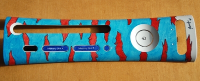 This is a custom plate with designs made with colored Sharpies in an animal stripe pattern, by DeviantArtist blueamcat. 
