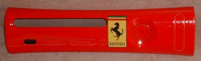 Red plate with the classic Ferrari logo.