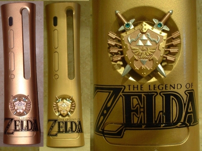 Multiple plates were made using the Zelda pins that were available at Hot Topic for a while. This plate was made vertically and the shield was painted in metallic colors and the swords were decorated with two Swarovski crystals.