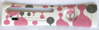 This plate was available in Japan and the UK since launch. They are not very expensive, but it can be difficult to find someone who will ship them to the US.  This plate was listed along with eight other plates that gamers could vote on and choose which plates would be made. Aluminum (Silver), Sun (Orange Swirl) and Pink Balloon were selected unchanged, so they are not listed seperately under 