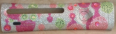 Custom faceplate made by Spacey's Mom, using self-adhesive jewels. The plate underneath is the Microsoft Pink Bubbles plate.